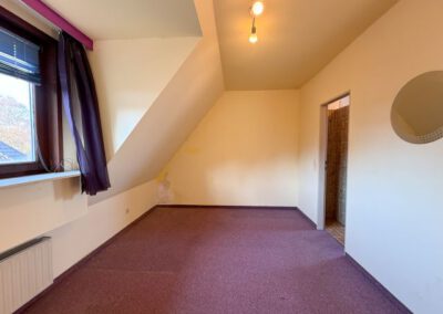 Wohnung 3 im Dachgeschoss Schlafzimmer